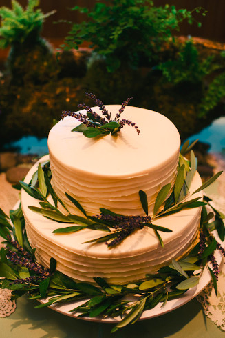 wedding cake with olive leaves and lavender world forestry center