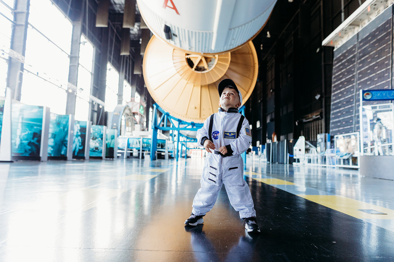 Huntsville space and rocket center young boy stands in museum