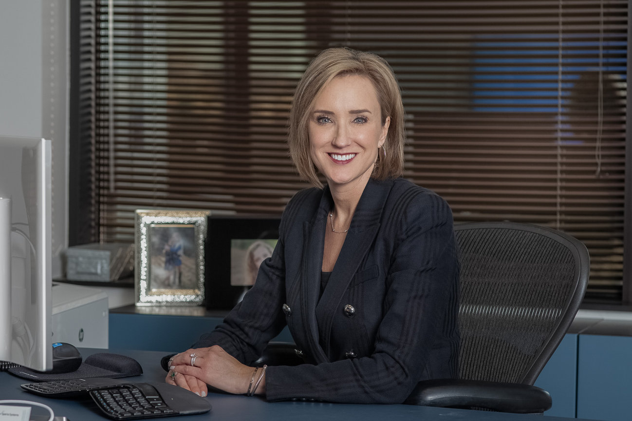 women CEO of Texas corporate headshots on site, professional dallas headshot photographer, red bow tie photography