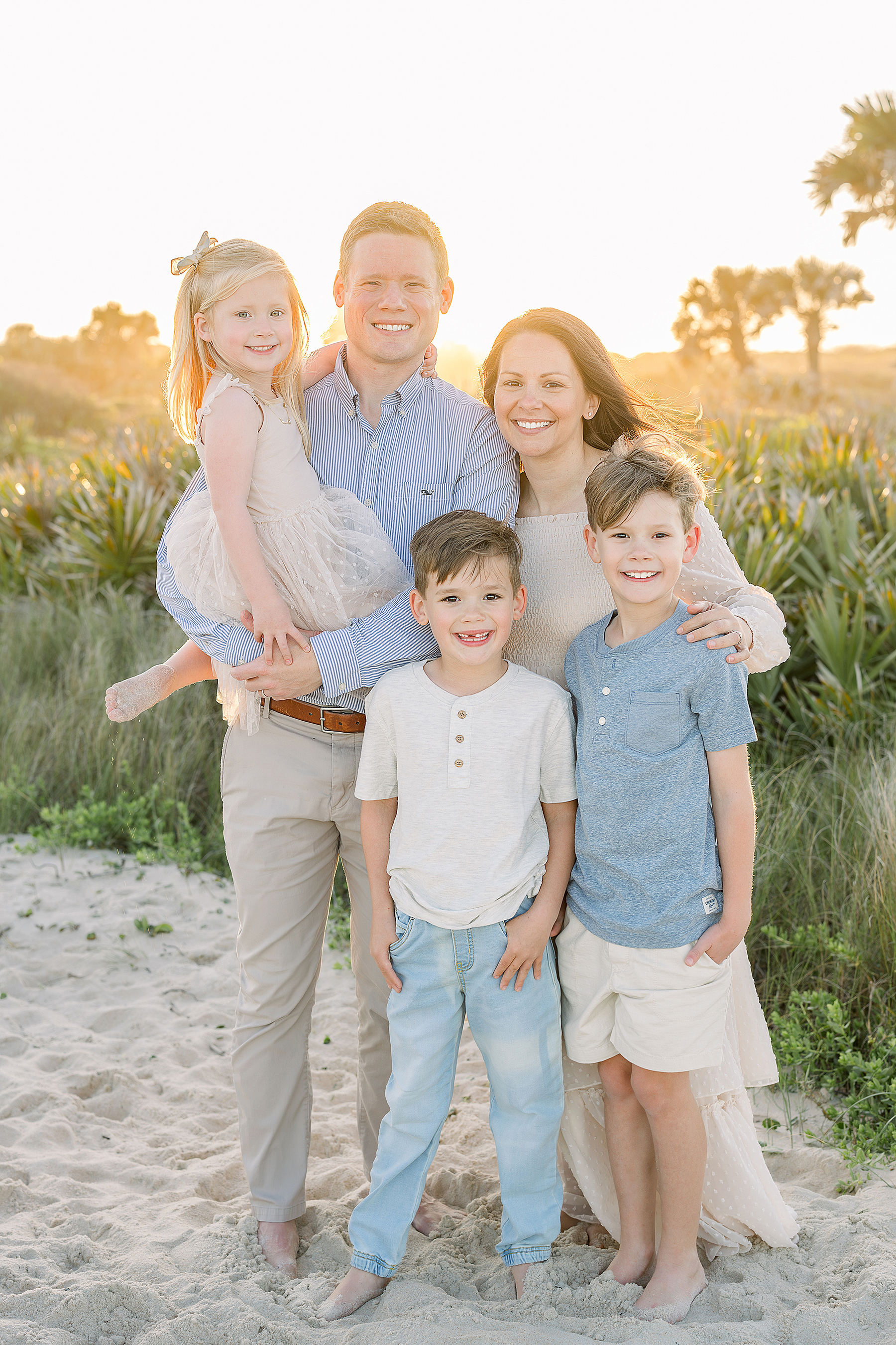 A sunset beach portrait of a family of five on St. Augustine Beach.