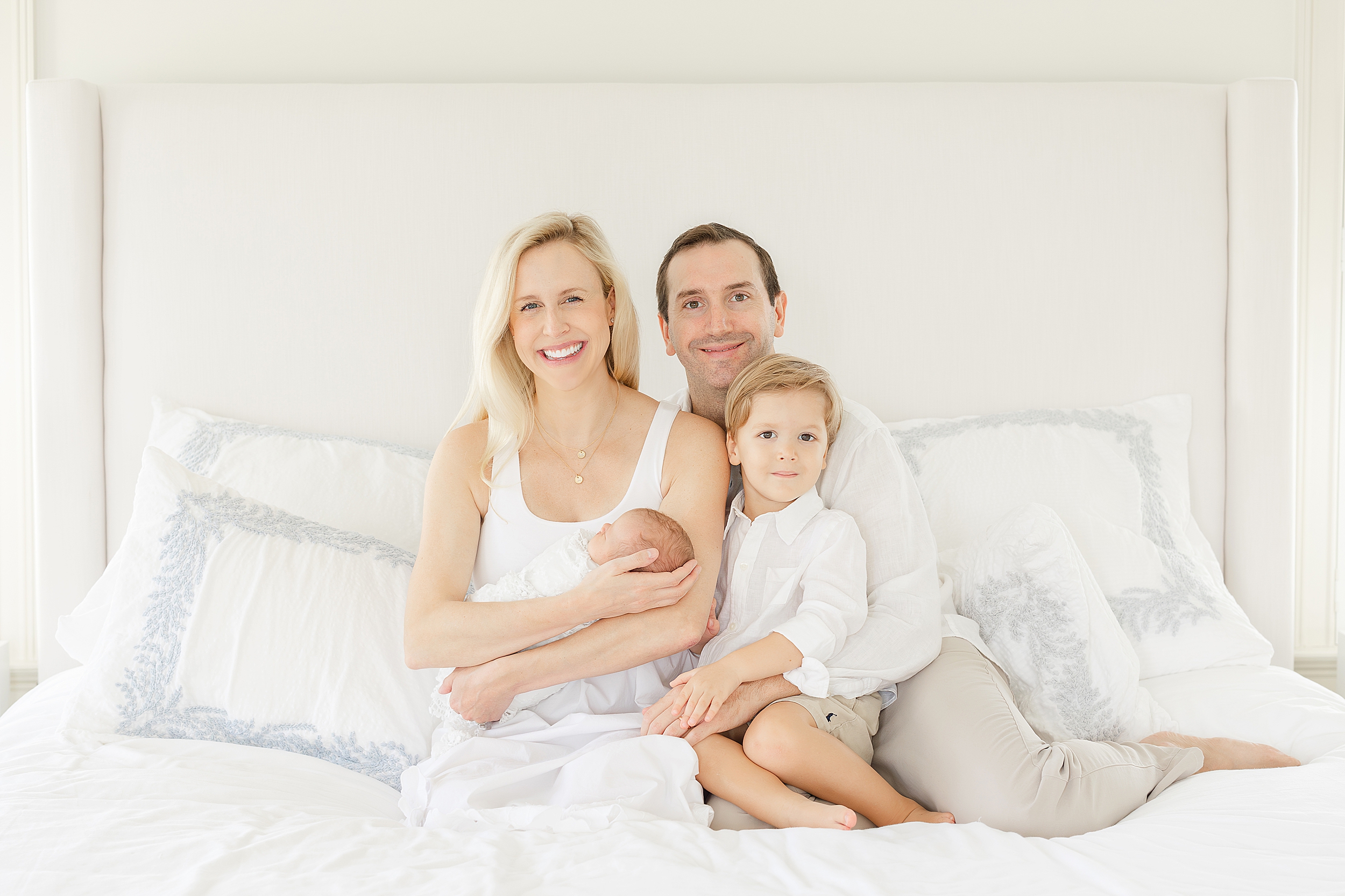 An airy in-home newborn portrait of a family in Ponte Vedra Beach, Florida.