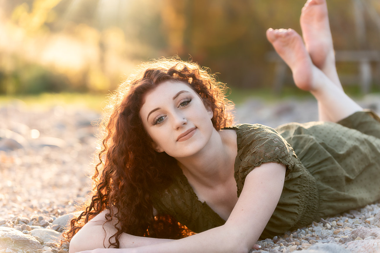 Senior Girl laying in the rocks, La Crosse Wi