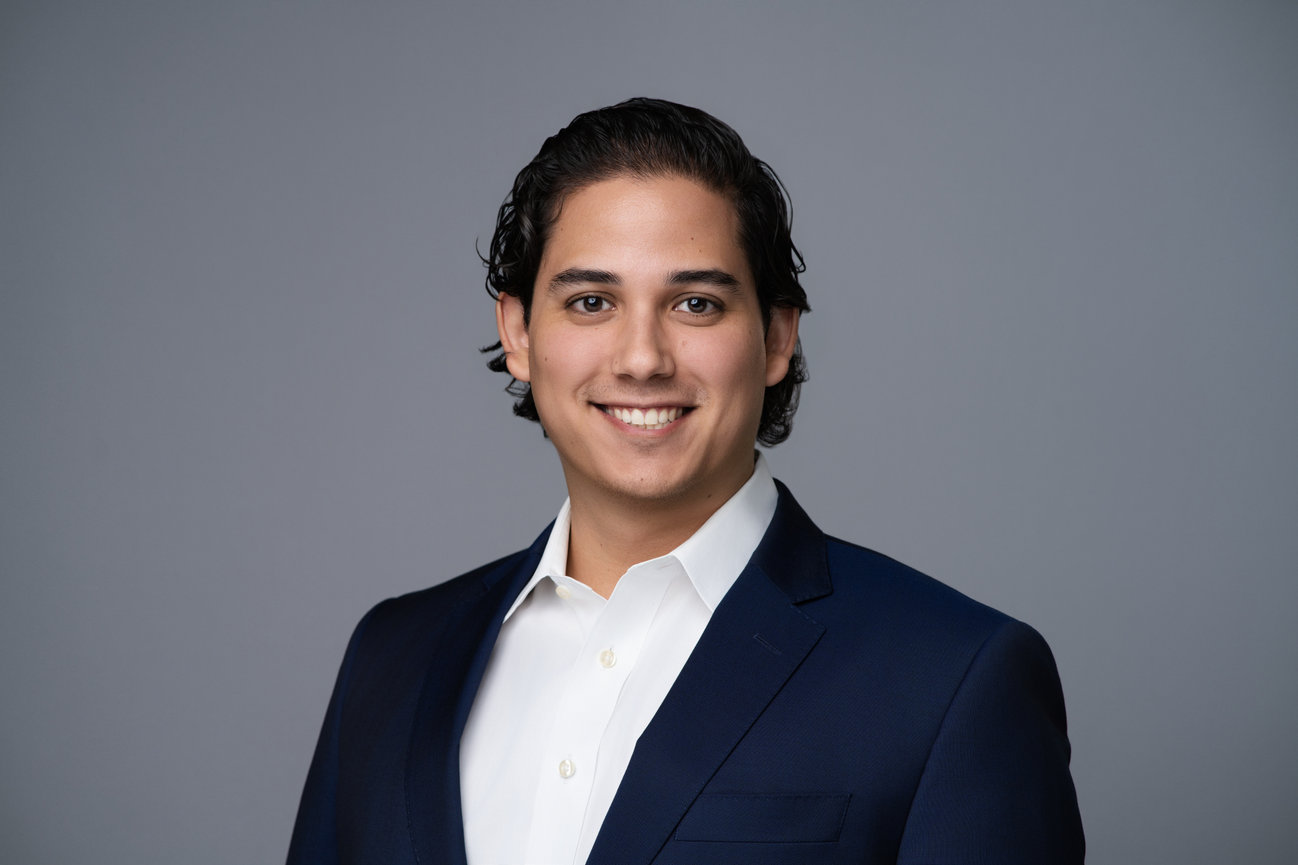 Executive-style professional headshot with studio lighting used for LinkedIn and corporate branding