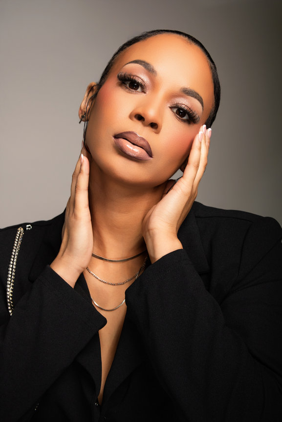 Woman with thoughtful pose in studio