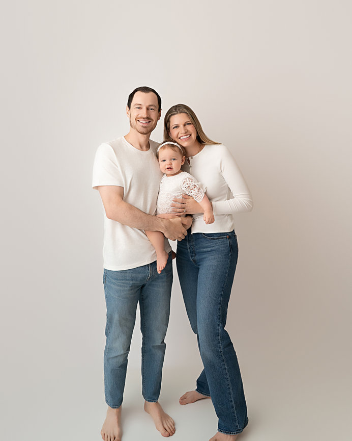 Family studio portrait in Manasquan with timeless white backdrop