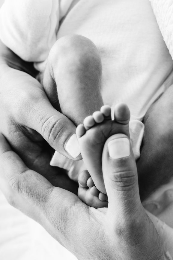 Timeless newborn toes in soft black and white during lifestyle shoot in Kristin Baker’s Manasquan studio