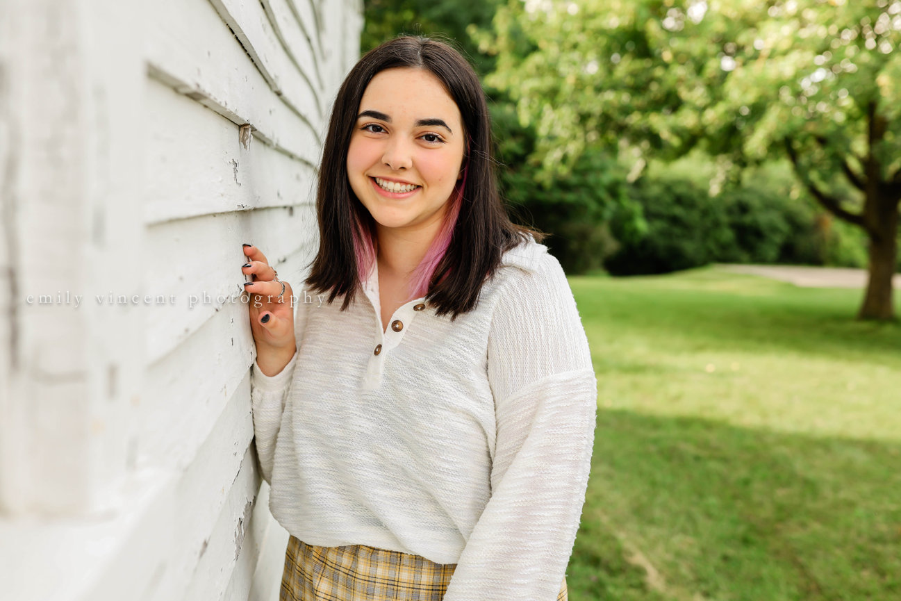 High school senior girl portrait outdoors with casual outfit