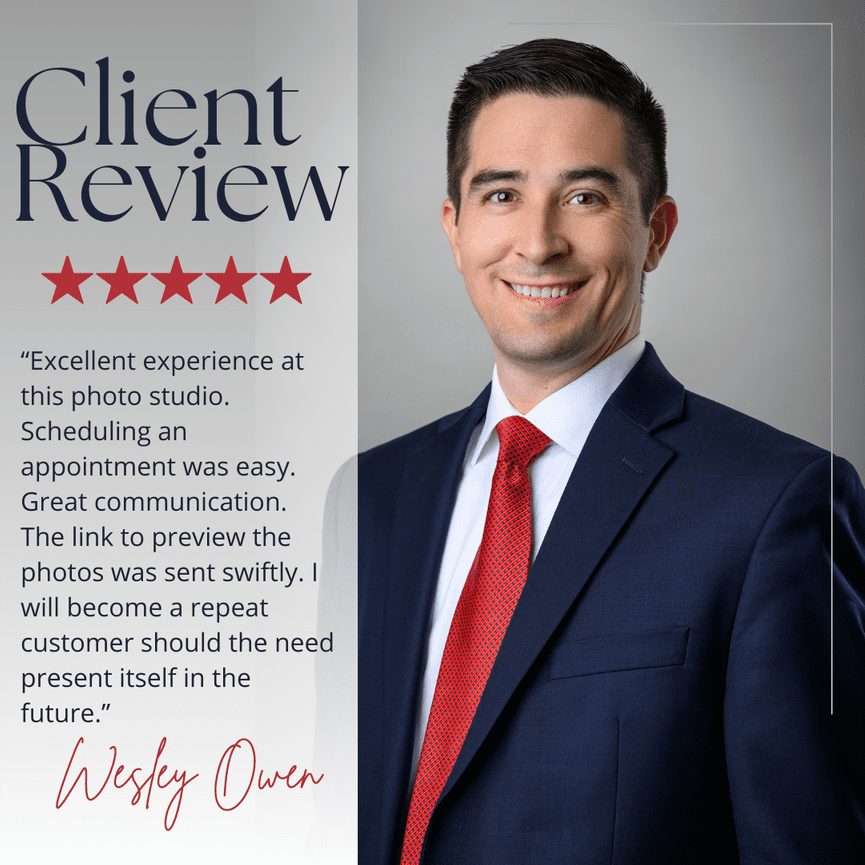 Man in a suit smiling next to a client review with five stars.