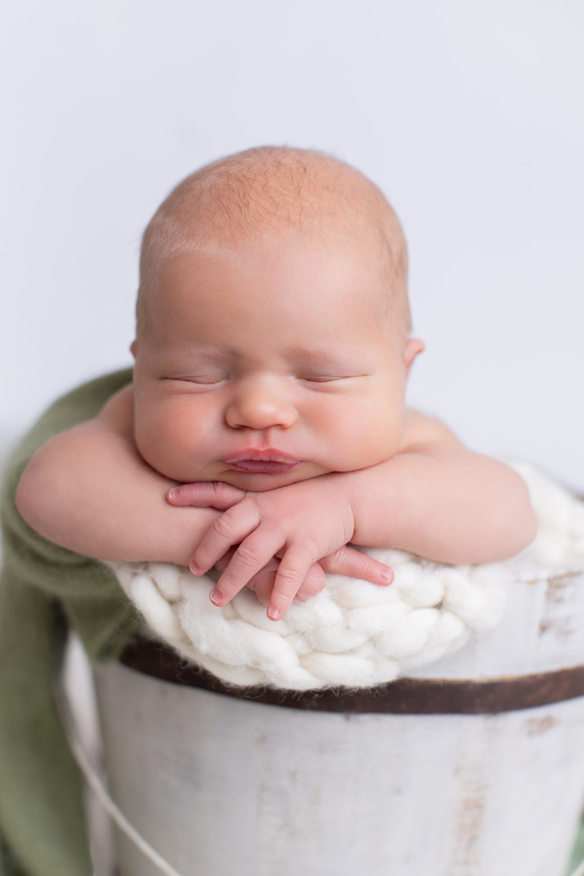 Calgary newborn photography white mauve and big brother love Newborn III session photo 1