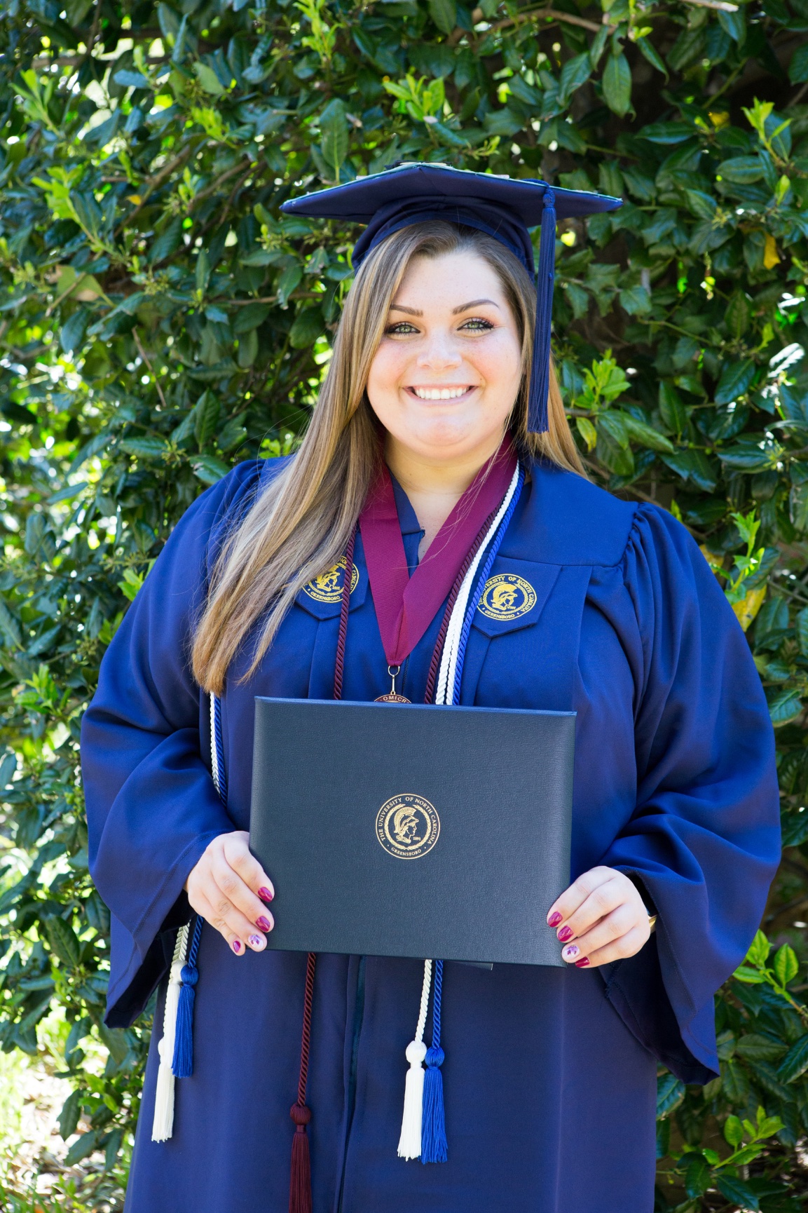 UNC Greensboro A Graduate Receives Her Diploma! Elizabeth Larson