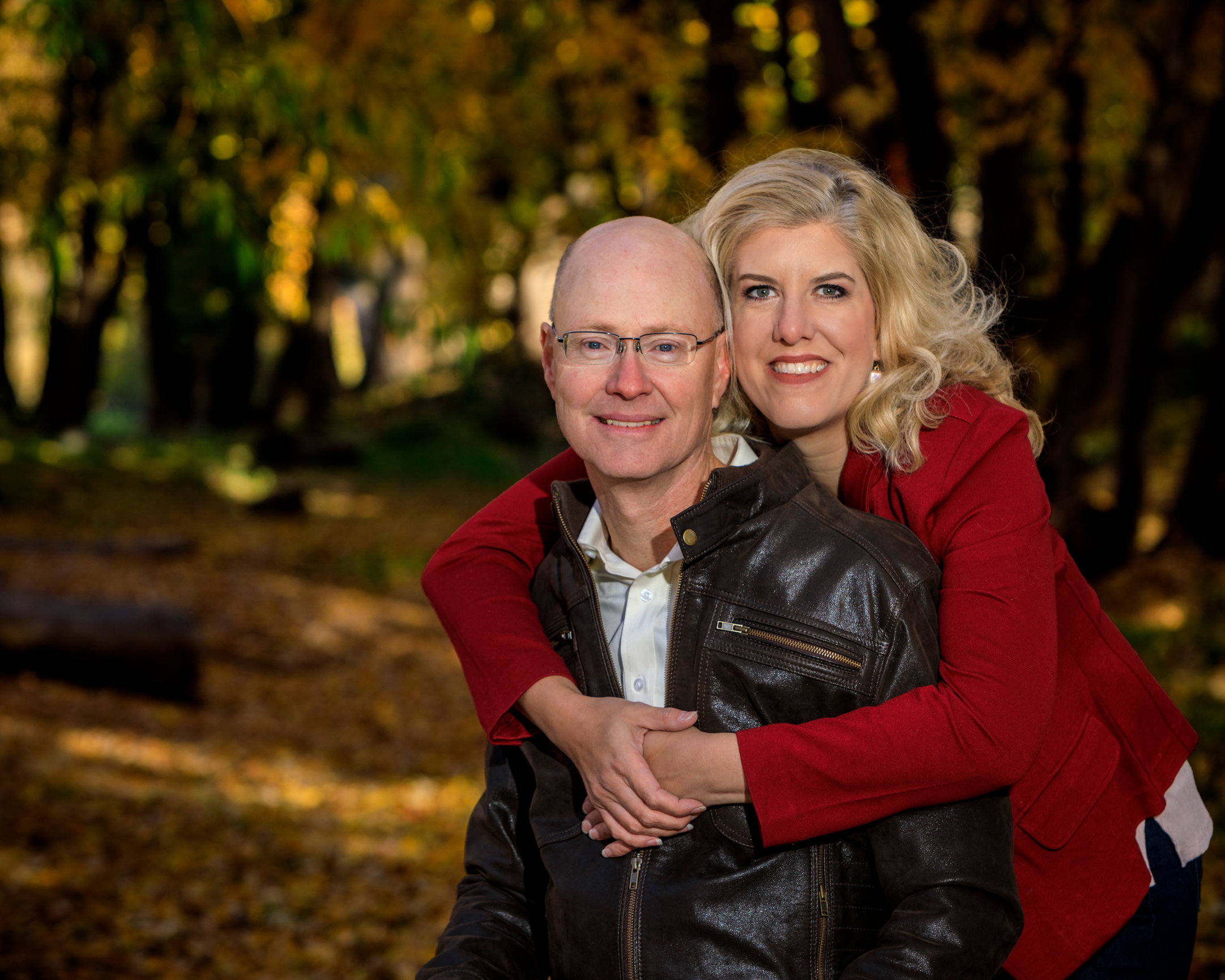 Couple portrait in the woods near the river.