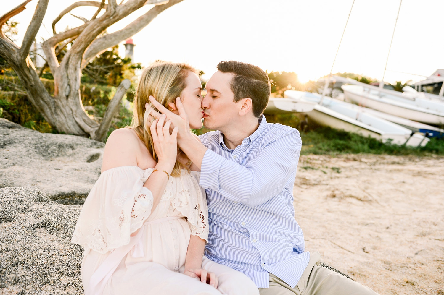 young couple kissing, maternity photoshoot, Saint Augustine Beach, Rya Duncklee