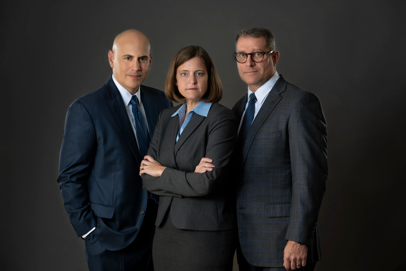 Photo of Group of Business people Two men one Women